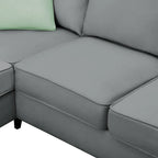 Canapé d'angle 7 places gris/noir avec pouf et 3 coussins